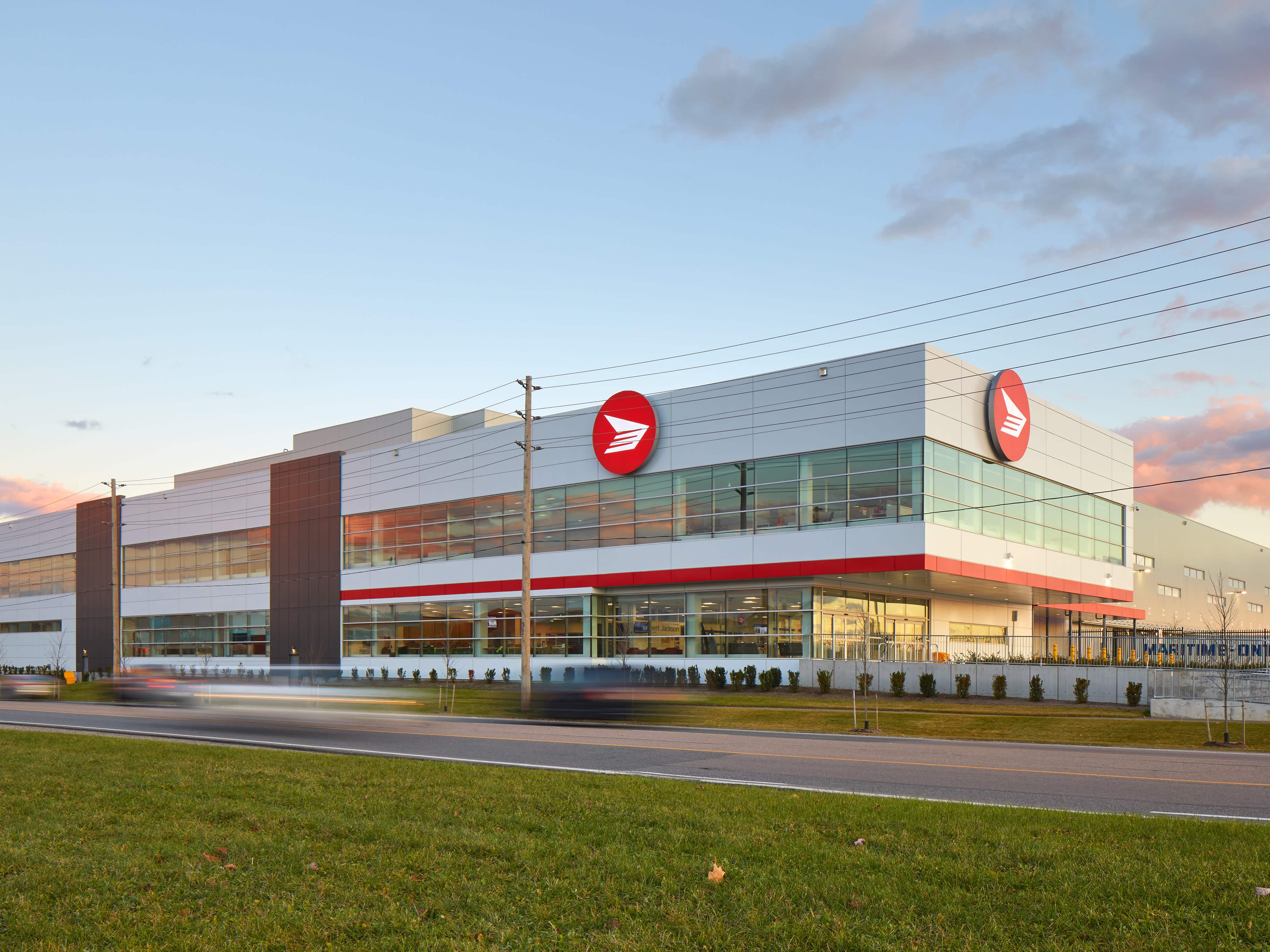 a building with a red and white logo